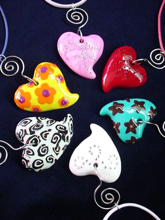 http://www.mjcrafts-designstudio.com/images/Fimo_Hearts_Pendants_and_Leather_Cord_Necklaces.jpg