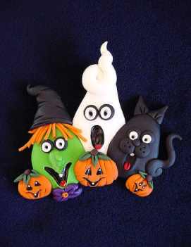 Halloween Party Pin-BOO! Give that final touch to this seasonal day! Handmade with polymer clay. Pin is created piece by piece. Pin bar on the back. All pins are boxed for protection. Unique design!