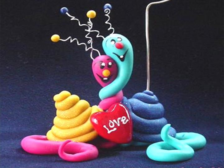 St. Valentines Day Snail Photo or Note Holder-Handmade with glazed Fimo. Nickel and silver wire are used for final details. Each Item can be personalized or the note can bring a special message-Handmade Crafts