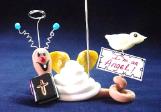 ReligiousSnail Photo or Note Holder-Handmade with glazed Fimo. Nickel and silver wire are used for final details. Each Item can be personalized or the note can bring a special message. (Please, specify it with your order)