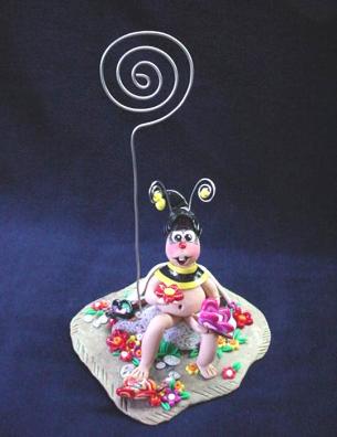 Handmade with FIMO. All details are hand crafted and finished with nickel silver wire. Unique Design!