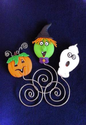 Halloween Bookmarks - BOO! Be prepare for the Halloween Season! Handmade with polymer clay and nickel wire. You may purchase them individually or in assorted quantities. Bookmarks are packed in pvc boxes ready for display.