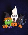Halloween Party Pin - BOO! Give that final touch to this seasonal day! Handmade with polymer clay. Pin is created piece by piece. Pin bar on the back. All pins are boxed for protection. Unique design!