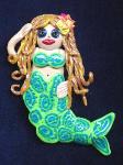 Fimo Mermaid Pin- Handmade with glazed Fimo. Silver plated  pin bar is used for final details.