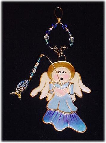 Christmas Fishing Angel Ornament- This porcelain handmade ornament is painted in translucent colors, antique gold paint and gold enamel details. AB Austrian Crystals, glass  beads and wire are used for final and hanging details. Oops! I got Jesus in the fish!