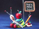 Back to School Snail Photo or Note Holder, handmade crafts- Handmade with glazed Fimo. Nickel and silver wire are used for final details. Each Item can be personalized or the note can bring a special message. (Please, specify it with your order)
