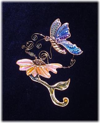 Flower & Butterfly Pin- This porcelain handmade, hand cut and hand-painted beautiful pin  is painted in translucent bright colors and gold enamel details. Embellished w/AB, Amethyst, Lt. Amethyst and Topaz Austrian Crystals. Gold plated wire and glass beads are used for final details. Unique design, one-of-a-kind ! 100% handmade.