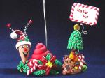 Christmas Snail Photo or Note Holder, handmade crafts-Handmade with glazed Fimo. Nickel and silver wire are used for final details. Each Item can be personalized or the note can bring a special message. (Please, specify it with your order)