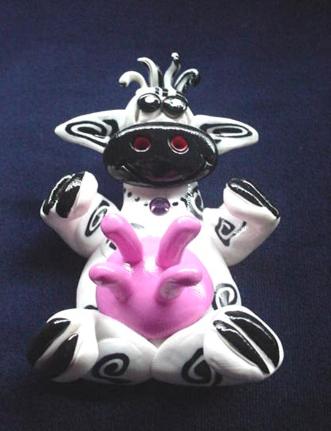 Handmade with glazed Fimo. Silver plated  wire is used for final details. Pins are embellished with Austrian crystals.