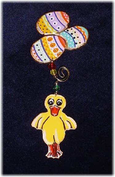 This porcelain handmade pin is hand-painted in translucent paints,  bright pastel colors and gold enamel details. Accented w/5mm Amethyst, Emerald and Sapphire Austrian Crystals. Gold plated wire and glass beads are used for final details. Unique Design!