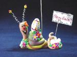 Easter Snail Photo or Note Holder, handmade crafts- Handmade with glazed Fimo. Nickel and silver wire are used for final details. Each Item can be personalized or the note can bring a special message. (Please, specify it with your order)
