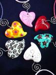 St. Valentine's Heart Pendant Necklaces-Handmade with glazed Fimo. Embellished with Austrian crystals. Leather cord, nickel wire and silver plated findings are used for final details. Perfect to match with any personal style. 