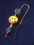 Whimsical Happy sun Bookmark-  Handmade of glazed Fimo. Gold plated findings and wire are used for final details. Different, fun and functional! Unique designs for any taste! More designs will be available soon!
