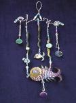 Whisical Fish in Coral Home Decor- This porcelain handmade pin is hand-painted in translucent paints,  bright colors and black enamel details. Embellished w/ real polished stones. Accented w/Medium and 5mm Amethyst and Aquamarine Austrian Crystals. Silver plated wire is used for final details. Unique Design!