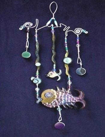 This porcelain handmade pin is hand-painted in translucent paints,  bright colors and black enamel details. Embellished w/ real polished stones. Accented w/Medium and 5mm Amethyst and Aquamarine Austrian Crystals. Silver plated wire is used for final details. Unique Design!