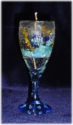 Medium Size Gel Candle- Lt. Blue glass goblets. Gel wax and glass fish are used to embellish the gel candle. Dry flowers sticks are used to create the coral atmosphere. Zinc-cored wick for great and secure burning process. Unique designs!  All fragrances available! Specify the fragrance with your order. Thank you.