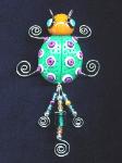 Fimo Green Lady Bug Pin-Handmade with glazed Fimo. Silver plated  wire and glass beads are used for final details.