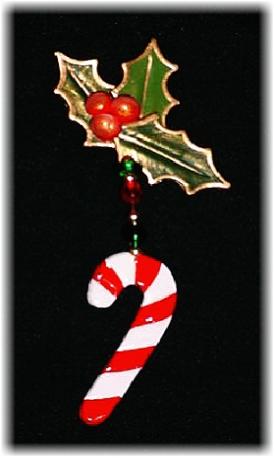 Christmas Candy Cane Pin- This porcelain handmade pin is painted in  bright colors and gold enamel details. Embellished w/glass beads and wire is used for final details. Unique Design!