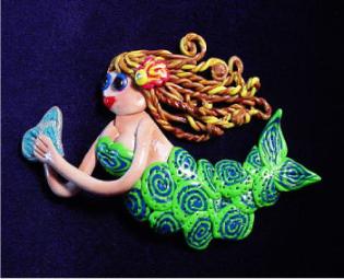 Mermaid in Motion Pin- Handmade with polymer clay. Austrian Crystals are use for final details. It can be created in different colors. Specify w/order. Unique and different.