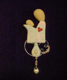 Mother and Child Pin-Handmade with Polymer Clay and Sterling Silver wire, findings and heart charm. Austrian Crystals are also used. Bar pin on the back. Jewelry box included. Unique and Beautiful for a Mother's Day Gift! Unique design, one-of-a-kind !100% handmade