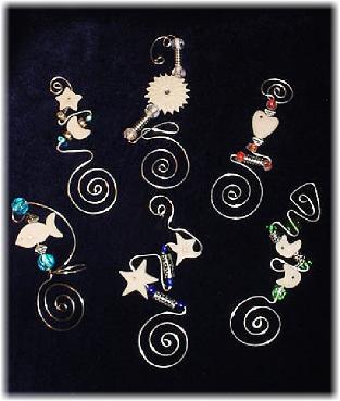 Handmade of glazed Fimo. Nickel wire is used for final details. Glass and pewter beads are used to embellish every bookmark. Accentuated with Austrian crystals. Unique designs!More designs will be available soon!