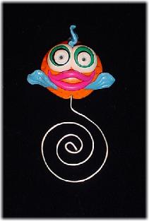 Orange Fishy Bookmark-Handmade of glazed Fimo. Nickel wire is used for final details. You can use them as bookmarks or paper clips. Different, fun and functional! Unique designs for any taste! More designs will be available soon!