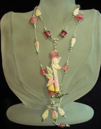Handcrafted Polymer Clay Pastel Pendant Necklace-Handcrafted with polymer clay. All findings, crimps, beads, bali beads and clasp are in sterling silver. Lampwork glass beads, Beadalon .018 inches silver wire are used for final details. Unique design! Beautiful and Elegant!