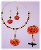Pumpkin complete Set -Pumpkin Necklace, Pumpkin Earrings and Pumpkin Pin. Complete set comes in a gift box. Very attractive for a Halloween gift or display!
