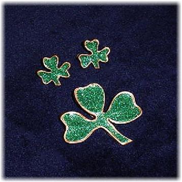 his porcelain handmade pin is hand-painted in green and gold enamel paints.  Accented w/Emerald glass glitter. Gold plated bar pin and earrings post are used for final details. Unique Design! 