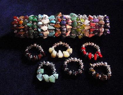 Handcrafted Semi-precious Stones Rings - Handcrafted with Semi-precious Stones Chips, Sterling Silver and Silver Plated findings and beads. Stretch cord is used to give flexibility. Only the Peridot ring (shown in hand) has two rows, the rest are only with one row. Beautiful to wear anytime. 