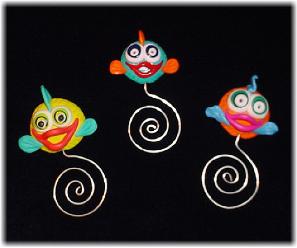 Handmade of glazed Fimo.Nickel wire is used for final details. You can use them as bookmarks or paper clips. Different, fun and functional! Unique designs for any taste! More designs will be available soon!