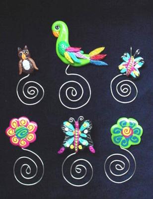 Handmade of glazed Fimo. Nickel wire is used for final details. You can use them as bookmarks or paper clips. Different, fun and functional! Unique designs for any taste! More designs will be available soon!