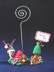 Christmas Snail Photo Holder-Handmade with glazed Fimo. Nickel and silver wire are used for final details. Each Item can be personalized or the note can bring a special message. (Please, specify it with your order)