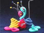 St. Valentine's Day Snail Photo or Note holder, handmade crafts-Handmade with glazed Fimo. Nickel and silver wire are used for final details. Each Item can be personalized or the note can bring a special message. (Please, specify it with your order)