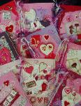 Valentine's Handmade Cards- Handmade papers, porcelain and/or polymer clay. Metal, crystals, beads, fiber and other beautiful materials are used to finish the cards. Each card is a unique design. Cellophane envelope for each card