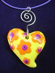 Handmade with glazed Fimo. Embellished with Austrian crystals. Leather cord, nickel wire and silver plated findings are used for final details. Perfect to match with any personal style.